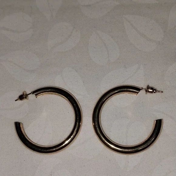 Pierced gold tone hollow hoop earrings - Picture 4 of 10